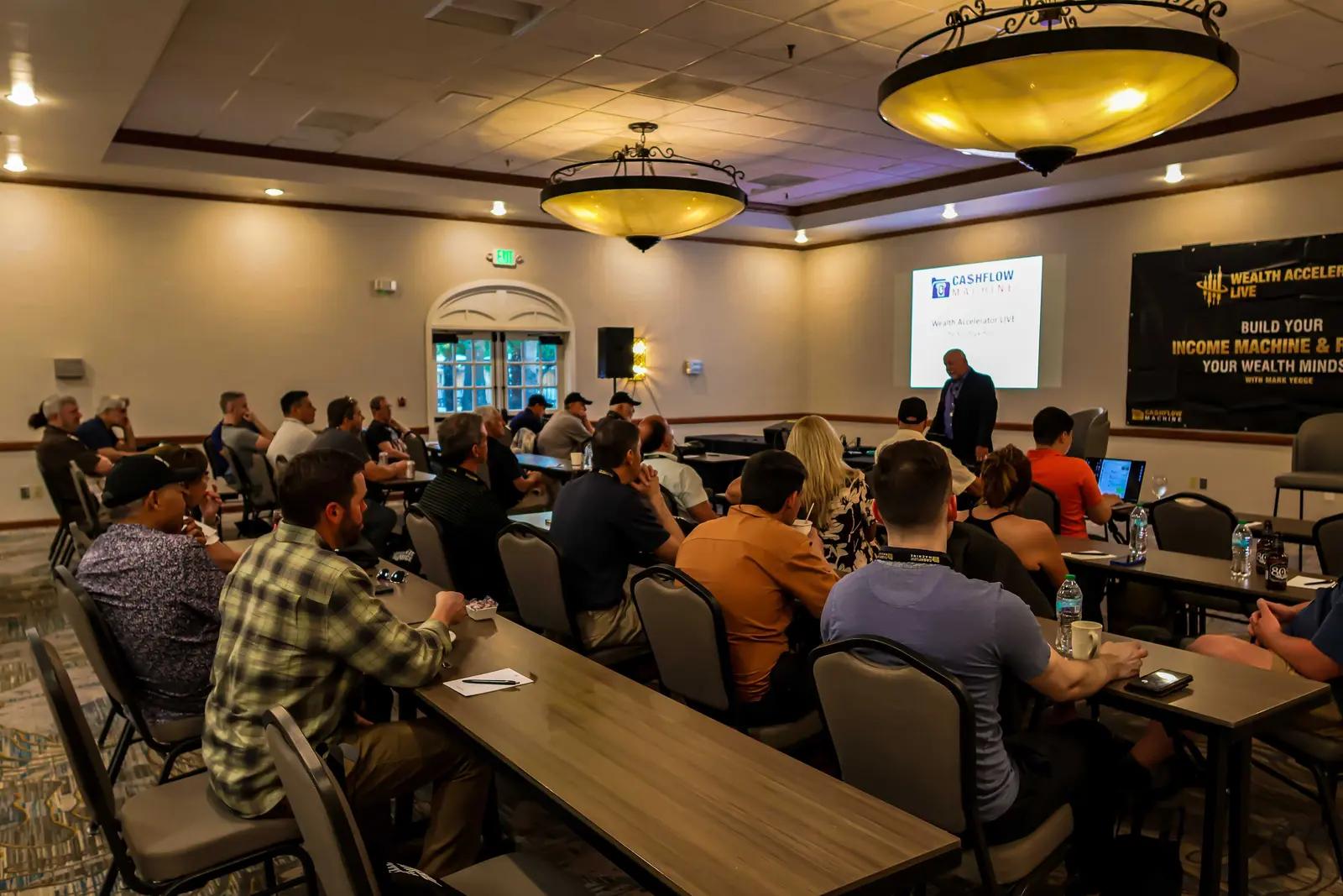 Phoenix attendees watching Mark teach in a large conference room
