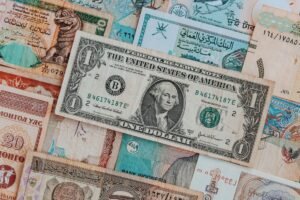 Covered Call On International Etfs Currency Hedged Versus Unhedged - editorial photograph